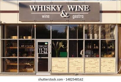 Storefront signage of Sri Amrut Winemart, Banjara Hills
